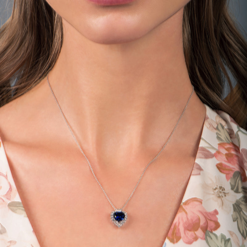 Jewelili Sterling Silver With Heart Shape Created Blue Sapphire and Round Shape Created White Sapphire Diamonds Pendant Necklace