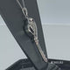 Load and play video in Gallery viewer, Jewelili Sterling Silver With Diamonds Heart Key Pendant Necklace
