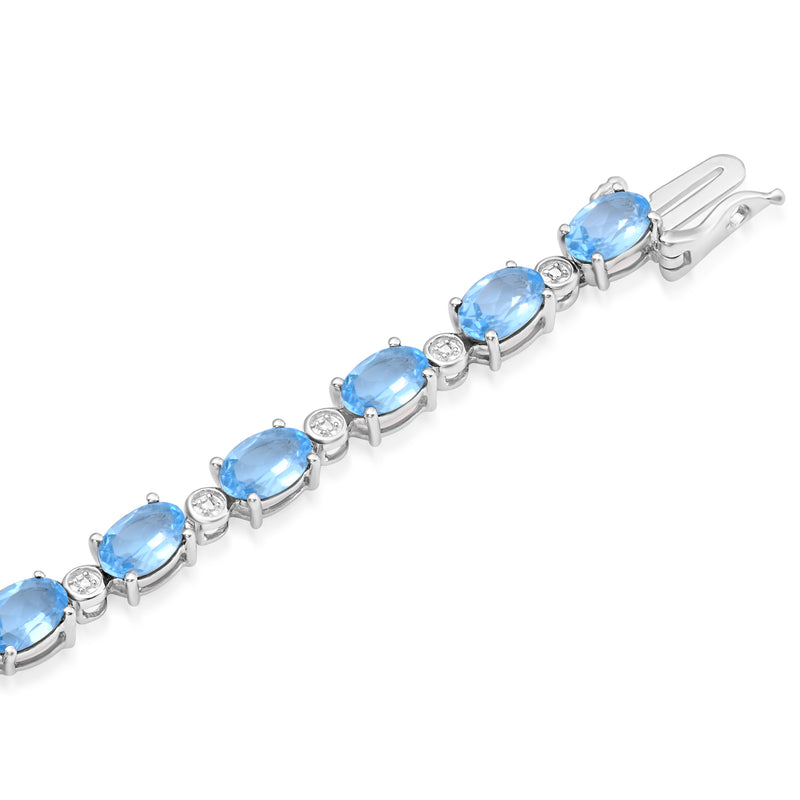 Jewelili Sterling Silver Oval Shape Swiss Blue Topaz and Natural white Round Diamond Accent Link Bracelet