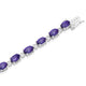 Load image into Gallery viewer, Jewelili Sterling Silver Oval Shape Amethyst and Natural white Round Diamond Accent Link Bracelet
