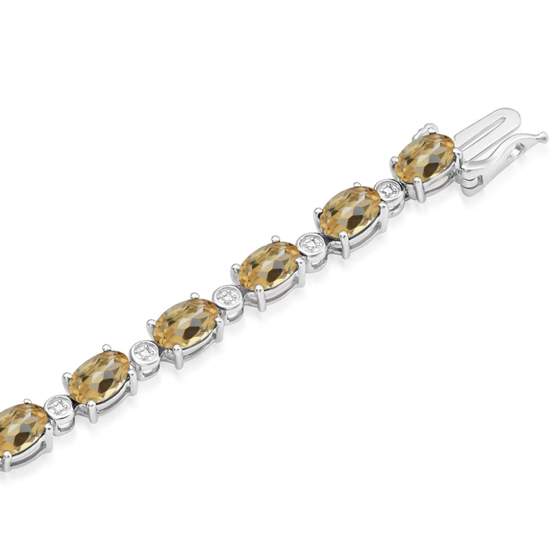 Jewelili Sterling Silver Oval Shape Citrine with Natural White Round Diamond Accent Link Bracelet