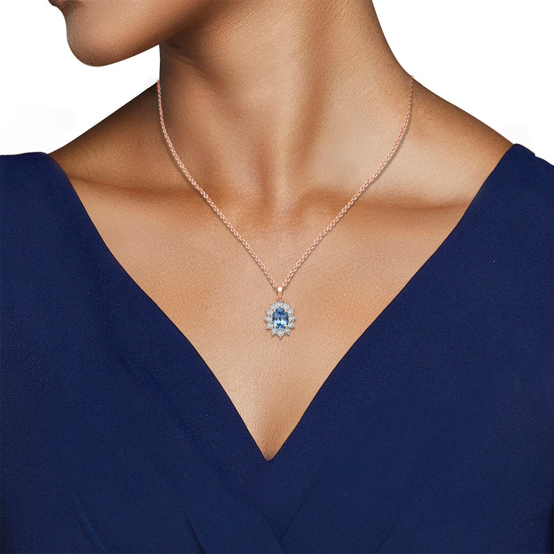 Jewelili 14K Rose Gold over Sterling Silver 7x5 MM Oval Genuine Swiss Blue Topaz and 1/20 Cttw Natural White Round Diamond Pendant Necklace