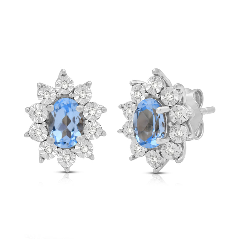 Jewelili Sterling Sliver 6x4 MM Oval Genuine Swiss Blue Topaz and 1/20 Cttw Natural White Round Diamond Cluster Stud Earrings