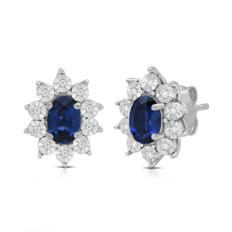Jewelili Sterling Sliver 6x4 MM Oval Created Blue Sapphire and 1/20 Cttw Natural White Round Diamond Cluster Stud Earrings