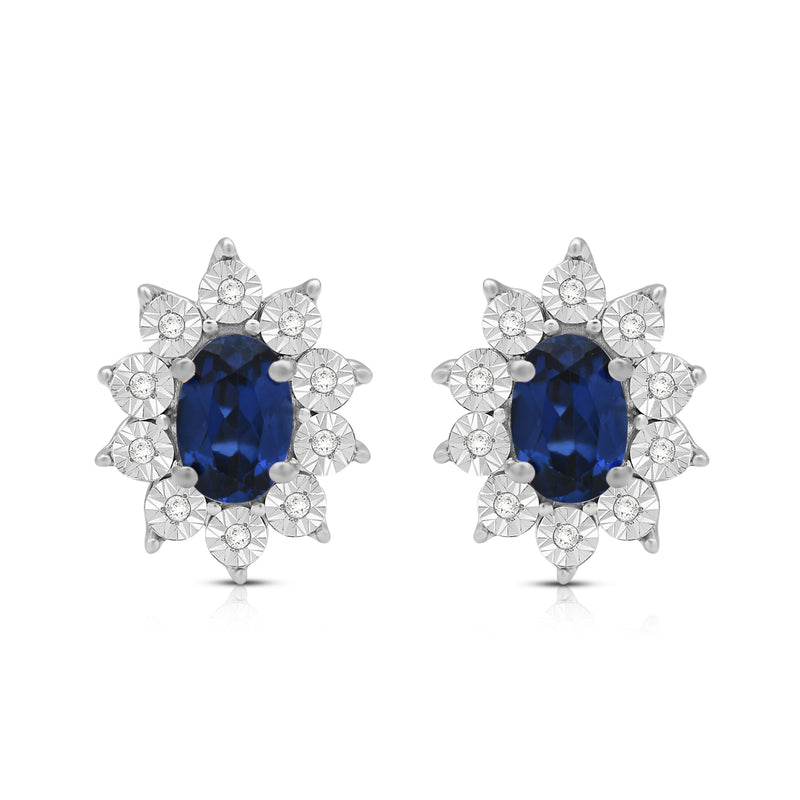 Jewelili Sterling Sliver 6x4 MM Oval Created Blue Sapphire and 1/20 Cttw Natural White Round Diamond Cluster Stud Earrings