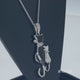 Load and play video in Gallery viewer, Jewelili Sterling Silver With Natural White Diamonds Enamel Cat Pendant Necklace

