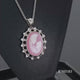 Load and play video in Gallery viewer, Jewelili Sterling Silver With Oval Shape Pink Cameo and Created White Sapphire Mother and Child Pendant Necklace, 18&quot; Cable Chain
