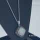 Load and play video in Gallery viewer, Jewelili Sterling Silver With Created Opal and Black White Diamonds Pendant Necklace
