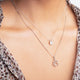 Load image into Gallery viewer, Jewelili Sterling Silver With Natural White Diamonds Dog Paw Pendant Necklace
