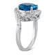 Load image into Gallery viewer, Jewelili Bypass Ring with Round Blue Topaz and White Topaz with Green Emerald in Sterling Silver View 4
