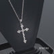 Load and play video in Gallery viewer, Jewelili 10K White Gold With 1/4 CTTW Natural White Diamonds Cross Pendant Necklace

