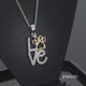 Load and play video in Gallery viewer, Jewelili Sterling Silver and 10K Yellow Gold With 1/10 CTTW Natural White Diamonds Love Paw Pendant Necklace
