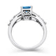 Load image into Gallery viewer, Jewelili Ring with Octagon Swiss Blue Topaz with Baguette and Round Created White Sapphire in 10K White Gold View 2

