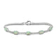 Load image into Gallery viewer, Jewelili Sterling Silver 7x5mm Oval Created Opal and Created White Sapphire Bracelet, 7.5 inch
