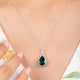 Load image into Gallery viewer, Jewelili 10K White Gold With Diamonds with Created Emerald and Created White Sapphire Teardrop Pendant Necklace
