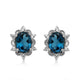 Load image into Gallery viewer, Jewelili Stud Earrings with London Blue Topaz and White Topaz in Sterling Silver View 3
