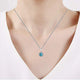 Load image into Gallery viewer, Jewelili Sterling Silver with Round Sky Blue Topaz and Cubic Zirconia Pendant Necklace
