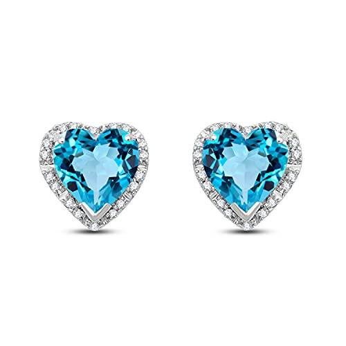 Jewelili 10K White Gold with Heart Shape Natural Swiss Blue Topaz and 1/10 CTTW Natural White Round Diamonds Stud Earrings