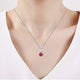 Load image into Gallery viewer, Jewelili Sterling Silver with Round Created Ruby and Cubic Zirconia Pendant Necklace

