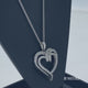 Load and play video in Gallery viewer, Jewelili Sterling Silver With 1/2 CTTW Diamonds Heart Pendant Necklace

