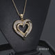 Load and play video in Gallery viewer, Jewelili 14K Yellow Gold over Sterling Silver with 1/4 CTTW Diamonds Heart Pendant Necklace
