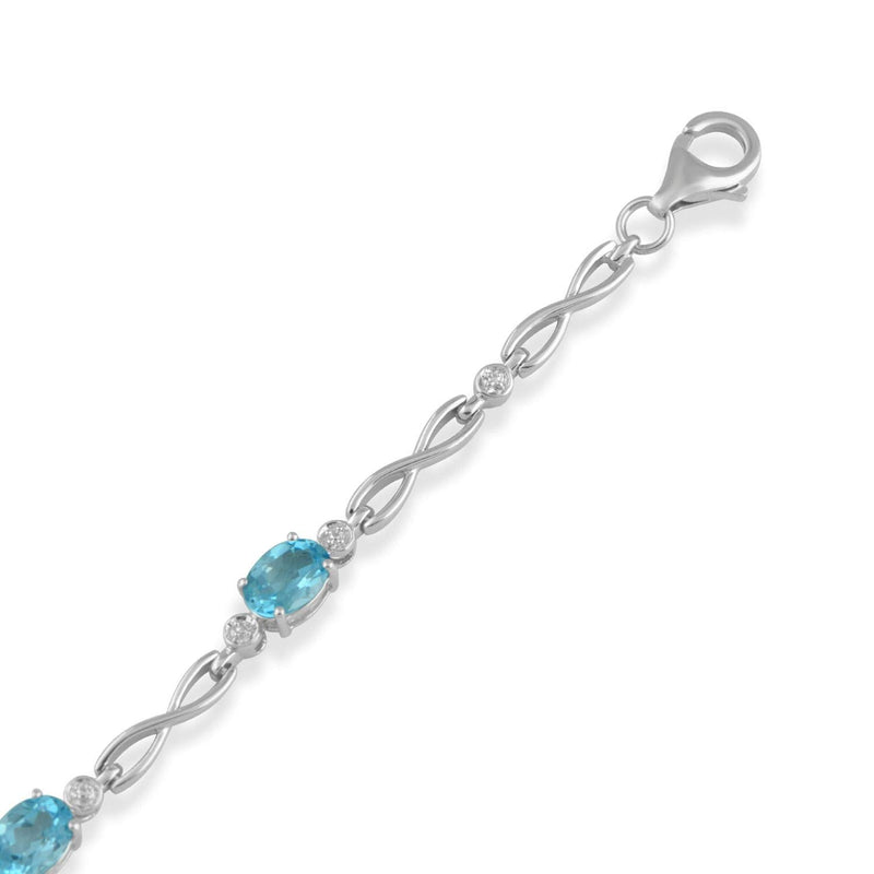 Jewelili Link Infinity Bracelet with Oval Shape Swiss Blue Topaz in Sterling Silver 7.25" View 1