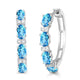 Load image into Gallery viewer, Jewelili Hoop Earrings with Oval Cut Swiss Blue Topaz and Round Created White Sapphire over Sterling Silver
