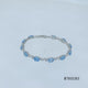 Load and play video in Gallery viewer, Jewelili Sterling Silver With Diamonds and Oval Swiss Blue Topaz Link Bracelet

