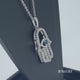 Load and play video in Gallery viewer, Jewelili Sterling Silver With 1/5 CTTW Treated Blue Diamonds and White Diamonds Hamsa Pendant Necklace
