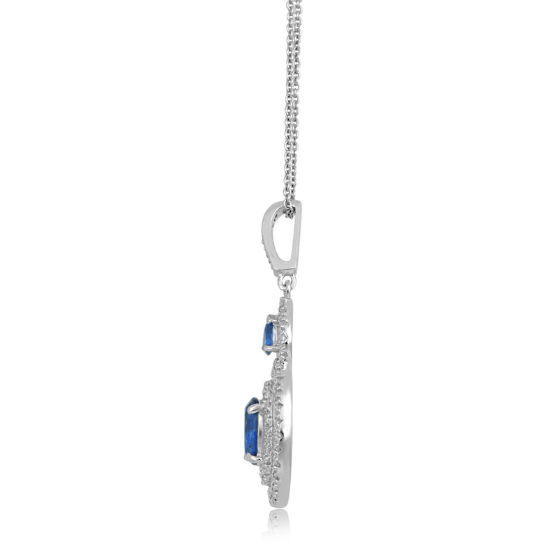 Jewelili Sterling Silver 6x8mm Oval Created Ceylon Sapphire, 3x4mm Pear Created Ceylon Sapphire and Round Created White Sapphire Halo Pendant Necklace, 18" Rolo Chain
