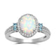 Load image into Gallery viewer, Jewelili Sterling Silver With Created Opal, Created White Sapphire and Swiss Blue Topaz Halo Ring
