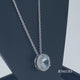 Load and play video in Gallery viewer, Jewelili Sterling Silver with Checker Board Round Aquamarine and Round Created White Sapphire Pendant Necklace
