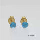 Load and play video in Gallery viewer, Jewelili 10K Yellow Gold with Round Shape Swiss Blue Topaz Stud Earrings
