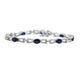 Load image into Gallery viewer, Jewelili Swirl Tennis Bracelet with Oval Created Blue Sapphire &amp; Round Created White Sapphire in Sterling Silver
