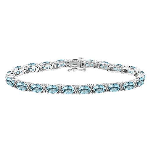 Jewelili Sterling Silver With Round Diamonds and Oval Shape Sky Blue Topaz Bracelet