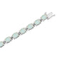 Load image into Gallery viewer, Jewelili Sterling Silver with 8 x 6 mm Oval Shape Created Opal and White Diamonds Bracelet
