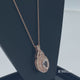 Load and play video in Gallery viewer, Jewelili 10K Rose Gold With Oval Shape Morganite and Round White Diamonds 1/4 CTTW Halo Pendant Necklace, 18&quot; Rope Chain
