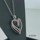 Load and play video in Gallery viewer, Jewelili 14K Rose Gold over Sterling Silver 1/10 CTTW Diamonds Heart Pendant Necklace
