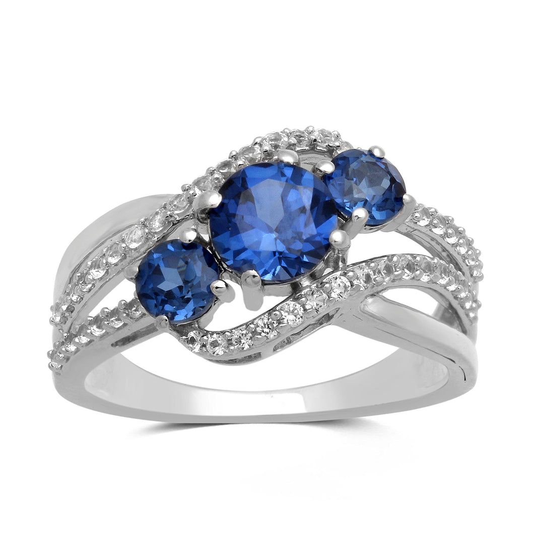 Jewelili Bypass 3-Stone Ring with Round Created Blue Sapphire and Created White Sapphire in Sterling Silver View 1