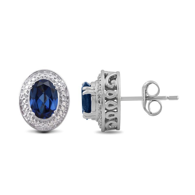Jewelili Sterling Silver with Oval Shape Created Blue Sapphire and Natural White Round Shape Diamonds Stud Earrings