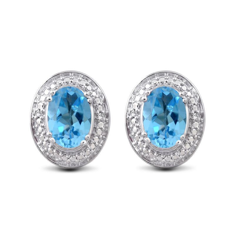 Jewelili Sterling Silver with Oval Shape Swiss Blue Topaz and Natural White Round Diamonds Stud Earrings