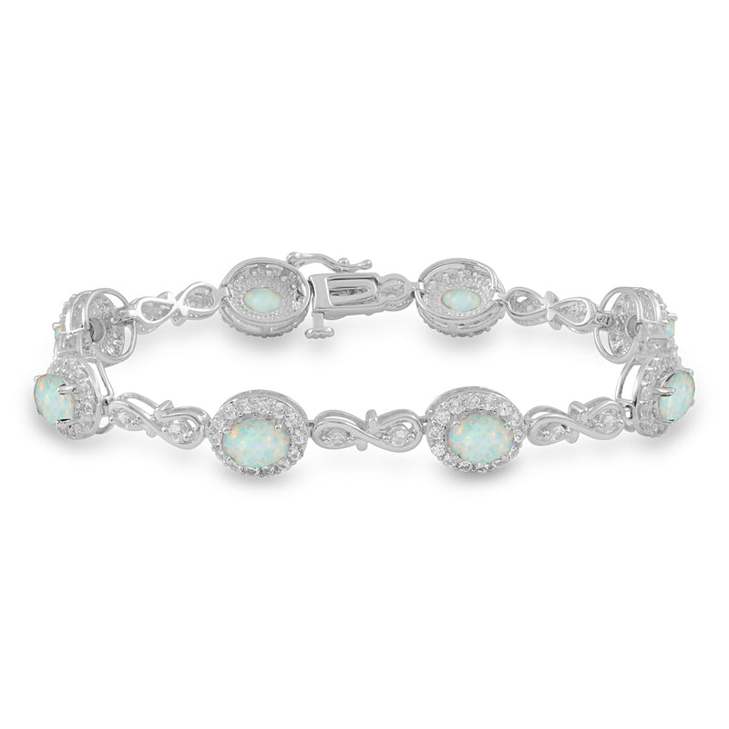 Jewelili Fashion Bracelet with Oval Shape Created Opal and Created White Sapphire in Sterling Silver 7 x 5 mm 7.25"