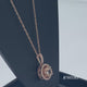 Load and play video in Gallery viewer, Jewelili 10K Rose Gold With Morganite and 1/10 CTTW Diamonds Halo Pendant Necklace
