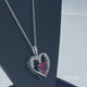Load and play video in Gallery viewer, Jewelili Sterling Silver with Created Ruby and Created White Sapphire Heart Pendant Necklace
