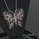 Load and play video in Gallery viewer, Jewelili Sterling Silver With 1/3 CTTW Treated Black Diamonds and White Diamonds Butterfly Pendant Necklace
