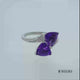 Load and play video in Gallery viewer, Jewelili Sterling Silver With Trillion Amethyst and White Diamonds Bypass Ring
