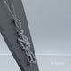 Load and play video in Gallery viewer, Jewelili Sterling Silver 1/10 CTTW White Diamonds Angel with Heart Pendant Necklace

