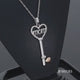 Load and play video in Gallery viewer, Jewelili Sterling Silver and 10K Rose Gold With Natural White Diamonds &quot;Mom&quot; Heart Key Pendant Necklace
