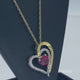 Load and play video in Gallery viewer, Jewelili 18K Yellow Gold Over Sterling Silver With Heart Shape Created Ruby and Round Created White Sapphire Two-Tone Heart Pendant Necklace
