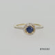 Load and play video in Gallery viewer, Jewelili 10K Yellow Gold with Round Blue Sapphire and 1/6 CTTW Round Natural White Diamonds Halo Ring
